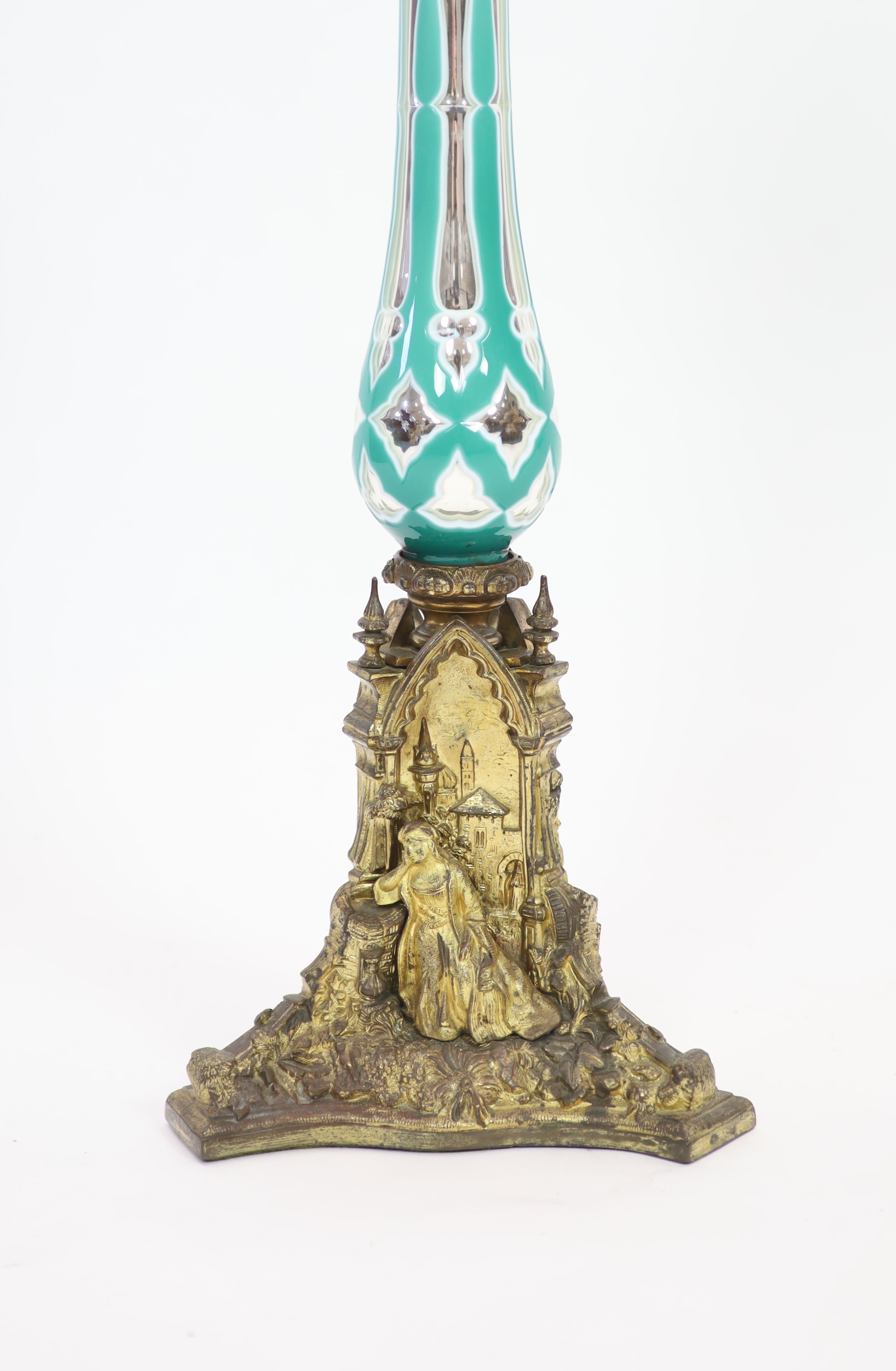 A rare ormolu mounted overlaid ‘mercury’ glass table lamp, the glass possibly by James Powell & Sons, mid 19th century, height 73cm